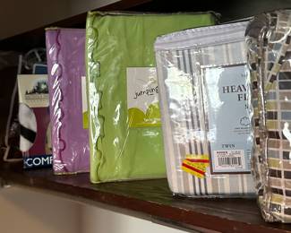 The linen department is open and waiting for you on the second floor! Towels, sheets, blankets, quilts and more! Vintage to new, in unopened packages! We have it all!