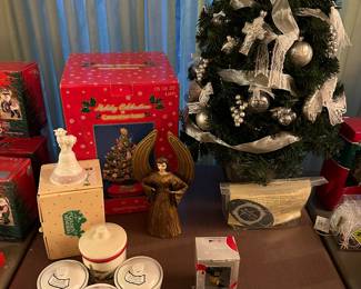 The Christmas Department is coming along nicely! There are MANY collections throughout! The tree in the upper right corner is a Waterford Christmas Tree! Produced in 2002, it comes complete with ALL ornaments, their holders, paperwork AND the original box! (Note: the U of M ornaments at the bottom of the pic ~ we have many U of M collectibles and items THROUGHOUT the house!