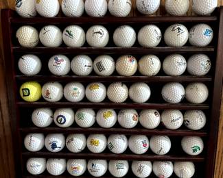 A golf ball collection with rack!