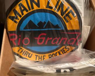 This sale has provided us with one surprise after another! This box does NOT disappoint. It is a box of UNOPENED VINTAGE RAILROAD COMPANY T-SHIRTS! There are MULTIPLE of each shirt!