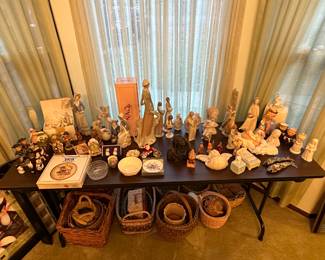 The dining room of the house has a table of higher end porcelain pieces! Hummel, Goebel, Lladro and more! Some sweet vintage items!