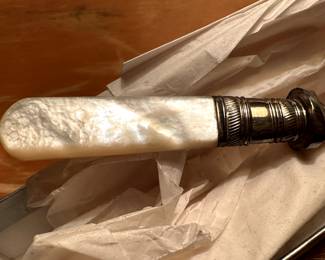 A very delicate fork with mother of pearl handle!