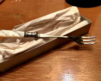 A very delicate fork with mother of pearl handle!