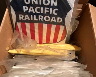 This sale has provided us with one surprise after another! This box does NOT disappoint. It is a box of UNOPENED VINTAGE RAILROAD COMPANY T-SHIRTS! There are MULTIPLE of each shirt!