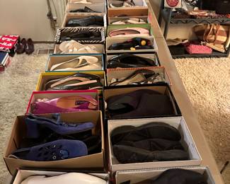 Al Bundy would be proud of our shoe display! Over 60 pairs, all in their boxes, many never worn and with the original receipts in the box! This is ON the table!