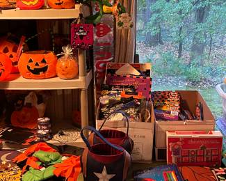 This is a huge election of Halloween items! Decorations, costumes and whatnots! Oops! I see a Santa coloring book!