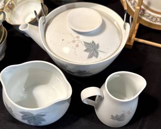 This is a Teapot/Coffee Set with cream and sugar - "Wild Ivy" by Noritake CookinServe