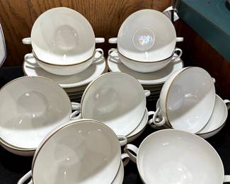 This is a service for 13! Arsberg plates and interesting bowls/cups with handles on both ends!