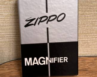 A fantastic Vintage Zippo MAGnifier! Mint in the original package! The Stalwart Rubber Company Advertisement!