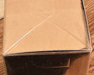 A wrapped unsealed MINT IN THE ORIGINAL PACKAGE of Donald Trump Eau De Toilette! 3.4 oz.