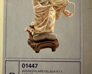 This is a beautiful example of the tons of Lladro figurines! MOST are MINT in their original boxes!