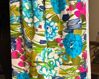 The sale has DOZENS of pieces of Vintage Clothing from ALL periods! This floral patterned 1970s skirt has a great surprise...