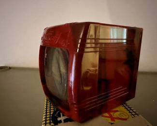 Here is a pair, in their original boxes, 35mm Slide Viewers! These are absolutely MCM! Both are red and black swirled Bakelite!