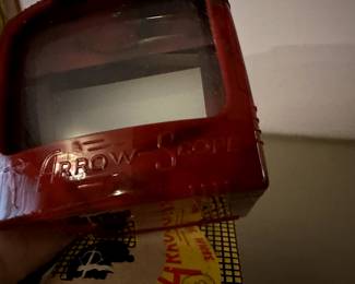 Here is a pair, in their original boxes, 35mm Slide Viewers! These are absolutely MCM! Both are red and black swirled Bakelite!