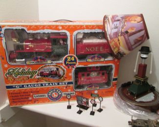 Several Boxed Christmas Train Sets