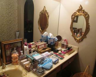 Bath Supplies & Gold-Framed Wall Mirror