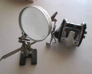 Magnifying Glass & Fishing Reel