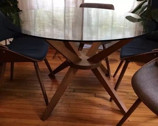 Gorgeous Mid Century style Table and 4 Chair. Glass Top from Wayfair.