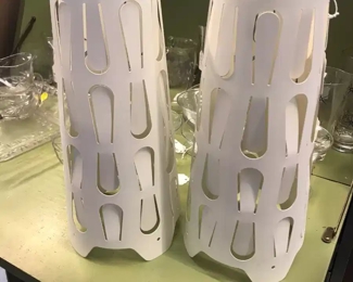 Thee are Lamp Shades. Put a simple bulb in stand on table and put the lamp shade over. Beautiful.