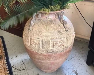 Nice Urn approx 3 ft with fern. Love the animal designs