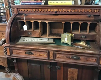 Love this late 1800's Rool Top Desk. Mixed wood. It i beautiful.