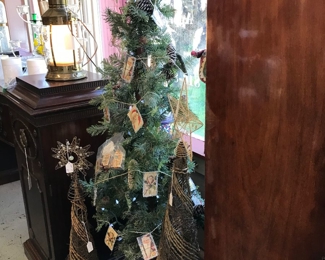 Treat comes with lights. Love our Christmas Garland and vine trees.