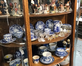 Nice Blue and White. NOrman Rockwell. Hummels are i another cabinet