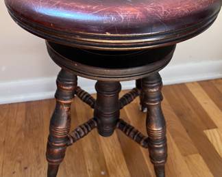 Vintage clawfoot swivel stool
