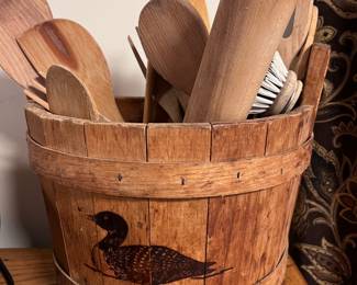 Wood utensils in half bucket