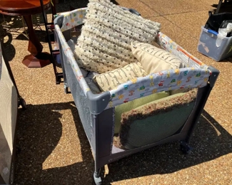 Several styles and colors of throw pillows