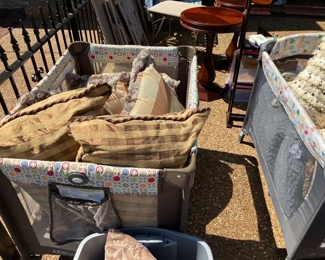 Several styles and colors of throw pillows