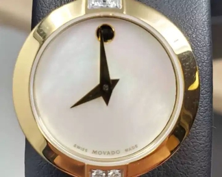 01 New Movado Womens Sapphire and Diamond Gold Cuff Bracelet Watch