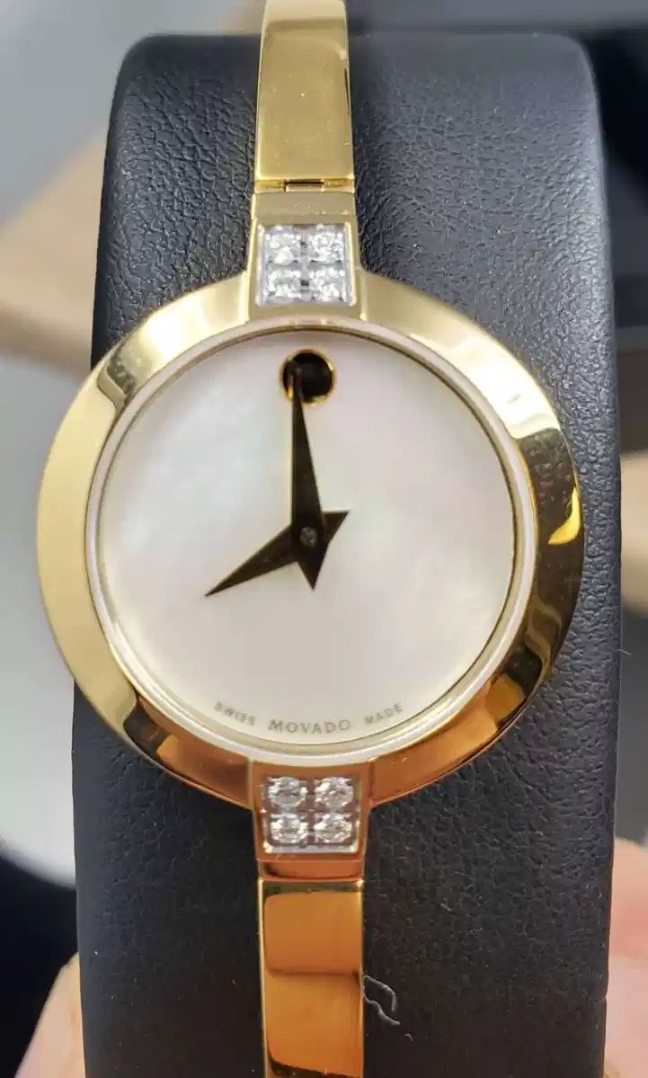 01 New Movado Womens Sapphire and Diamond Gold Cuff Bracelet Watch