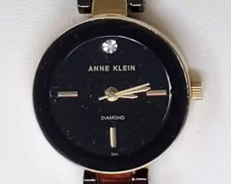 Anne Klein Womens Black Ceramic Bracelet Watch with Diamond Accent