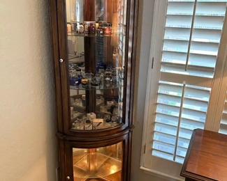 Curved glass corner lit curio cabinet 