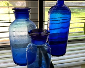 Beautiful blue glass, perfect for a window sill 