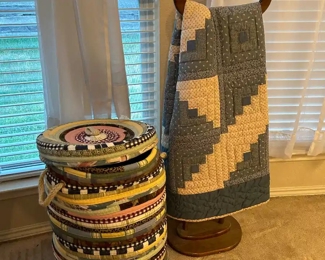 The cutest rag rug hamper & an oval wooden quilt rack