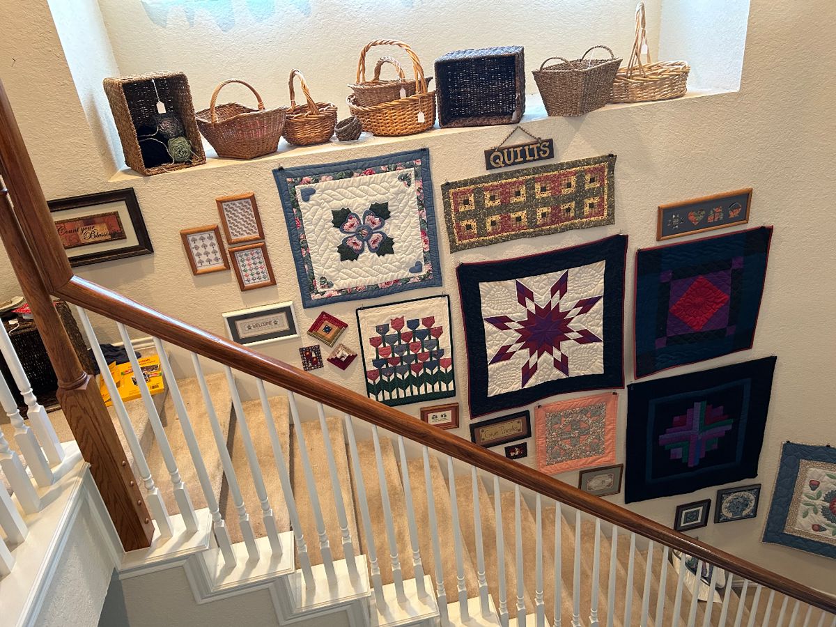 Baskets and beautifully quilted wall hangings