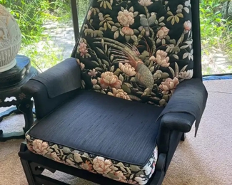 Pair or oriental fabric and dark wood chairs