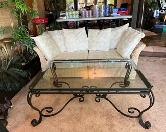 Bevel glass top table with ornate metal base