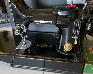 Antique Singer sewing machine in original carry case