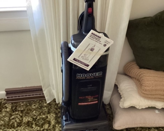 Hoover vacuum with book
