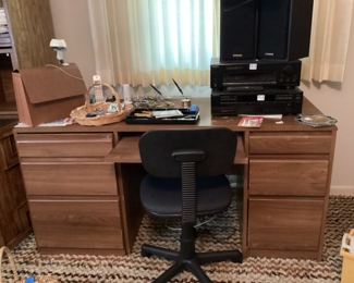 Desk topped with some electronics