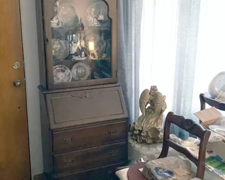 Hutch or china cabinet full of stuff