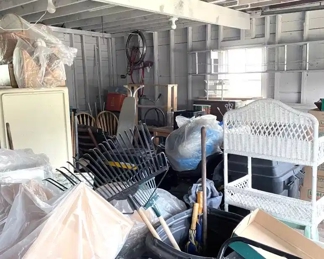 A two car garage PACKED FULL OF STUFF!