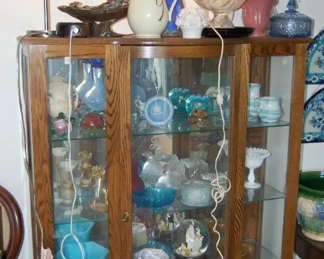 One of the Curio cabinets, there are 3