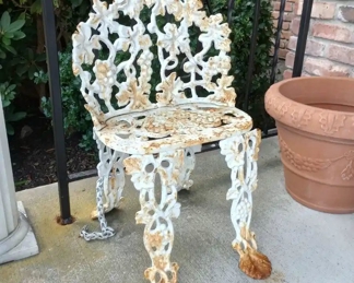 $100. Cast Iron Chair, 