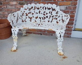 $200. Cast Iron Bench, 