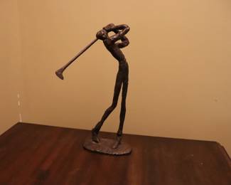 IRON SCUPLTURE OF SWINGING GOLFER IN  BRUTILIST STYLED STATUE