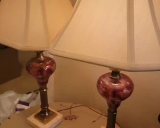 Pair of red cut glass lamps